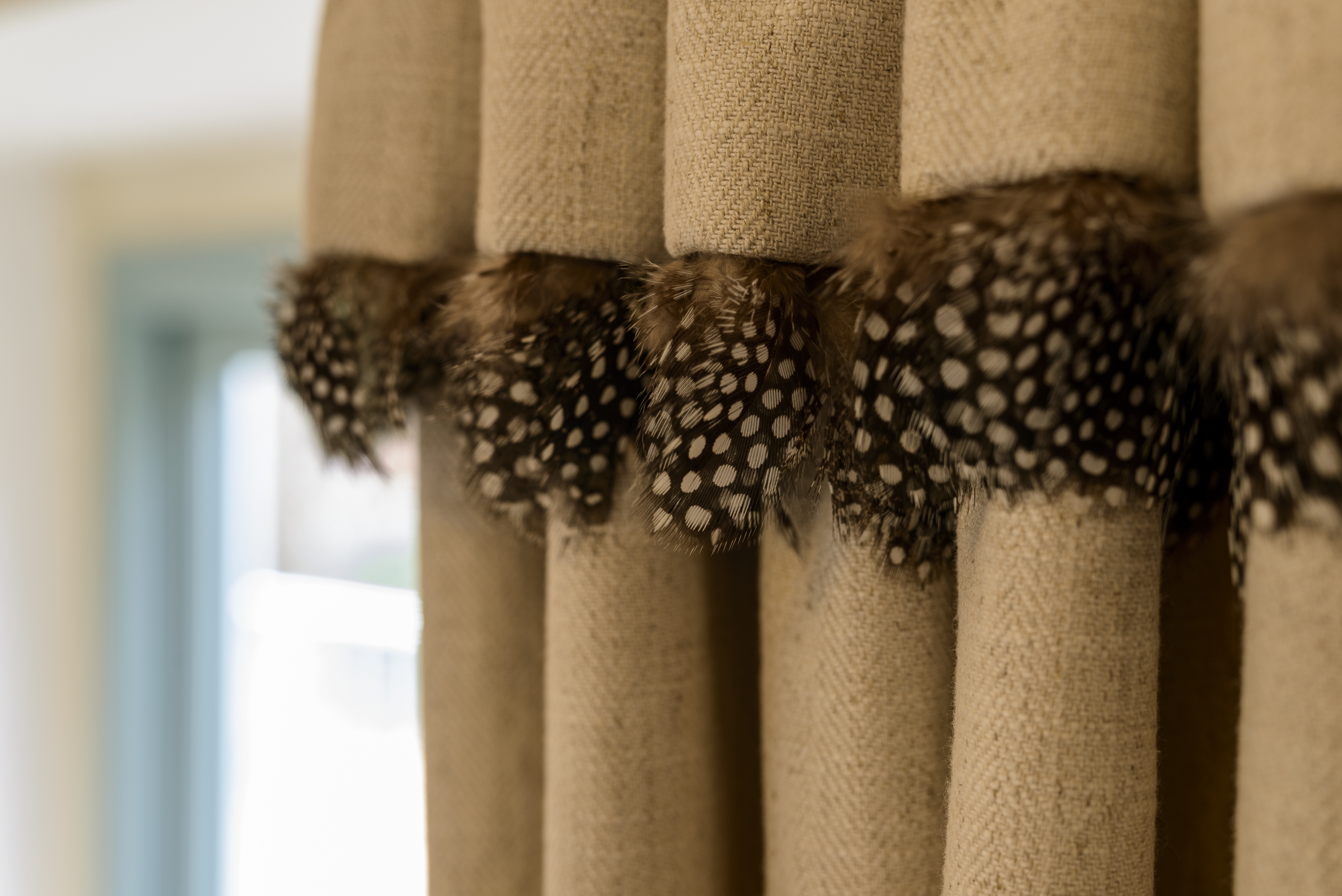 quinea fowl feather trim on curtains